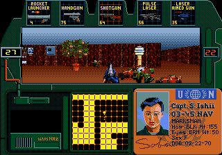 A screenshot from the game Zero Tolerance. An FPS game on the Sega Genesis. The screenshot shows a narrow gameplay window, with most of the screen taken up by HUD information. Such as a lost of weapon, a map, an ID card showing the character that is being used.