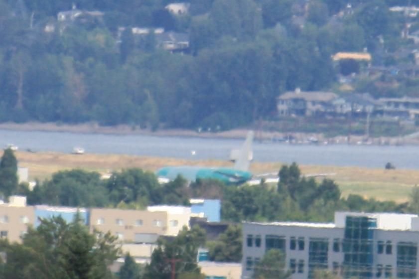 new unpainted green Boeing 777-200LR freighter landing on Runway 28R at Portland Int'l Airport KPDX
photo by Ian Kluft
July 10, 2025
Portland, Oregon, USA