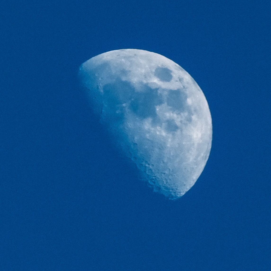 picture of the moon at daytime