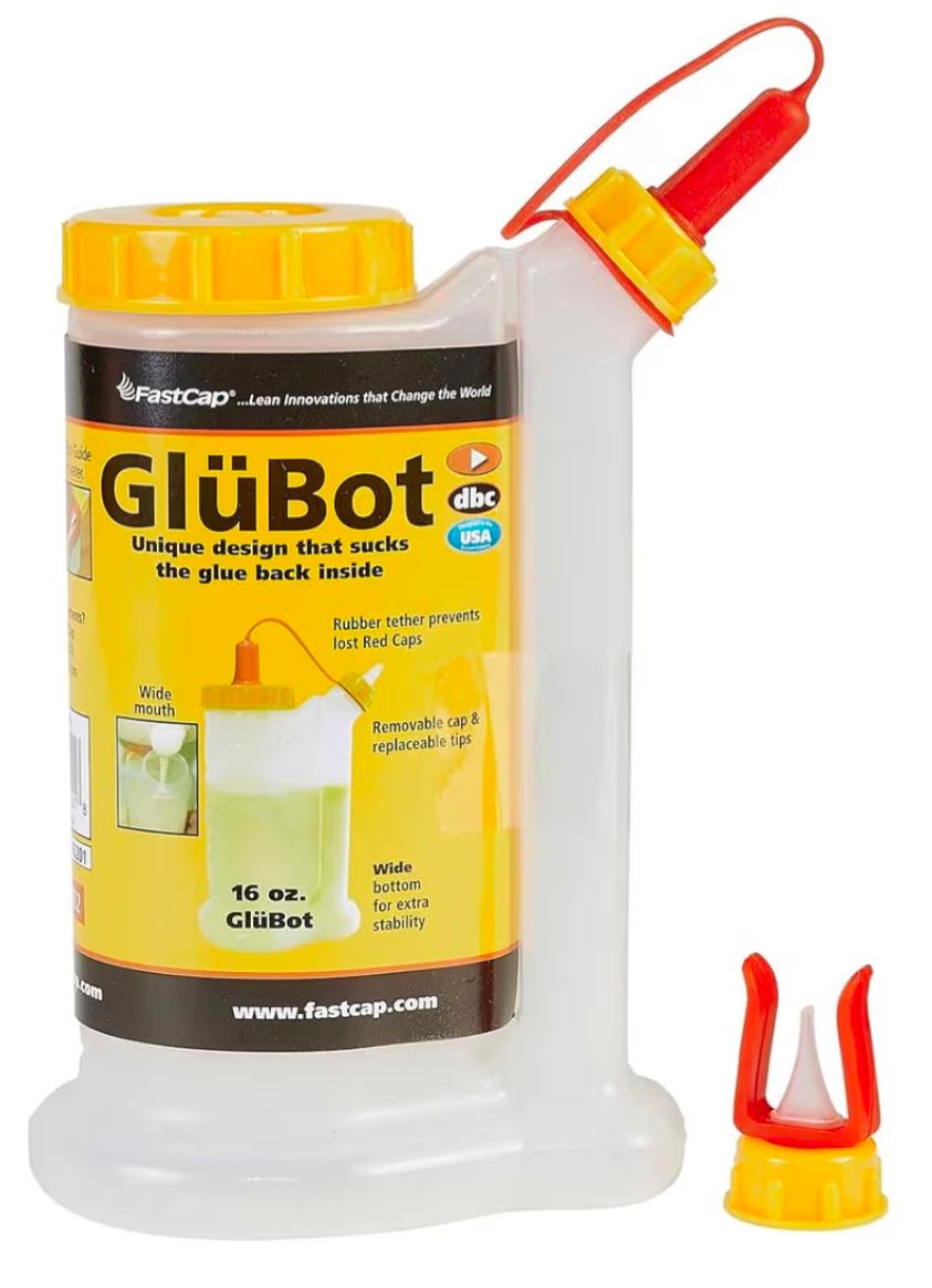 A bottle used to hold and spread wood glue.