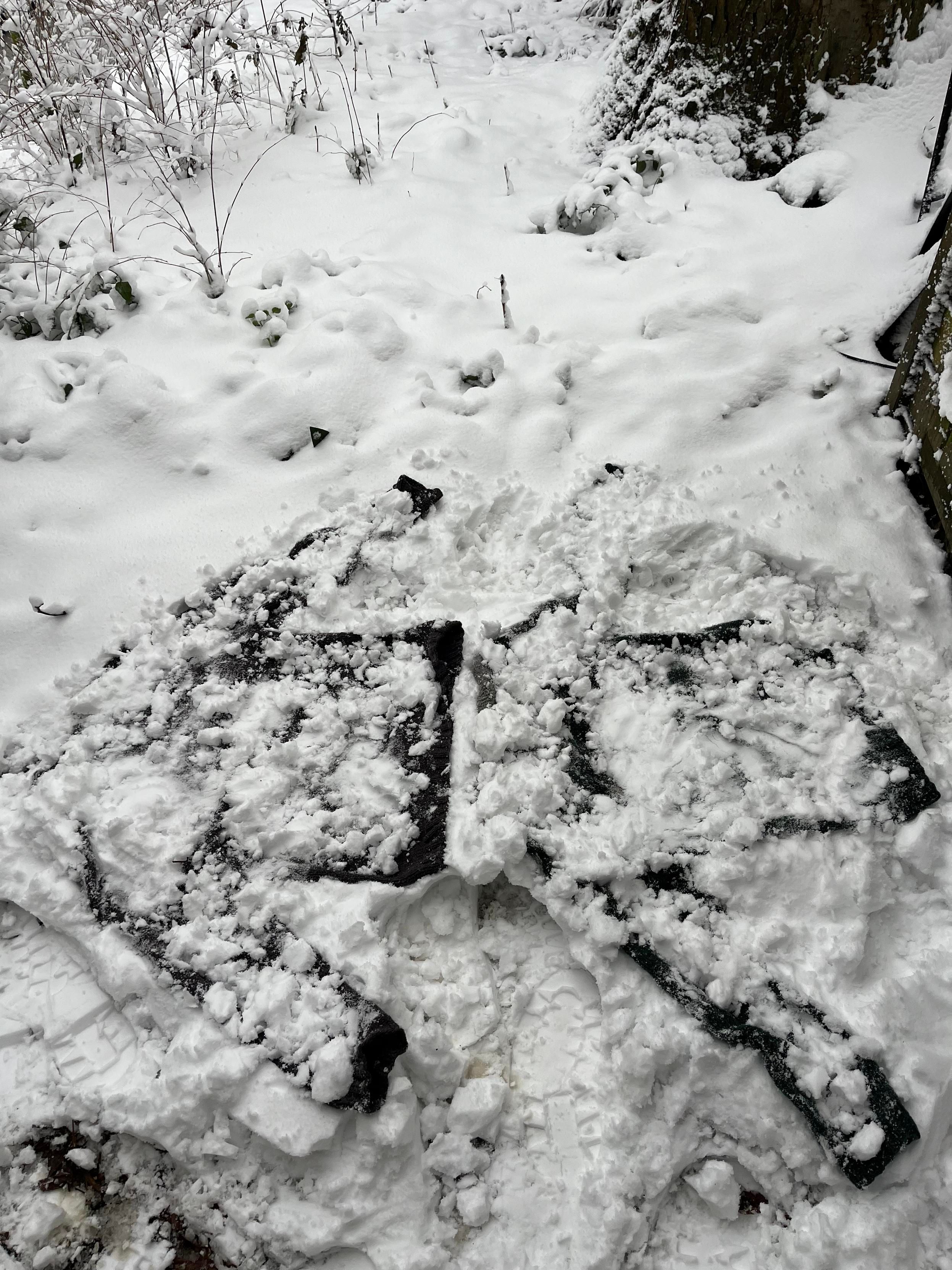 Same sweaters now covered with snow