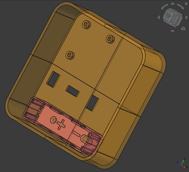 Screenshot from FreeCAD. Gray background. The base (basically a box without a lit and some cut outs) is yellow. The battery holder is red and inserted at the bottom of the base.
