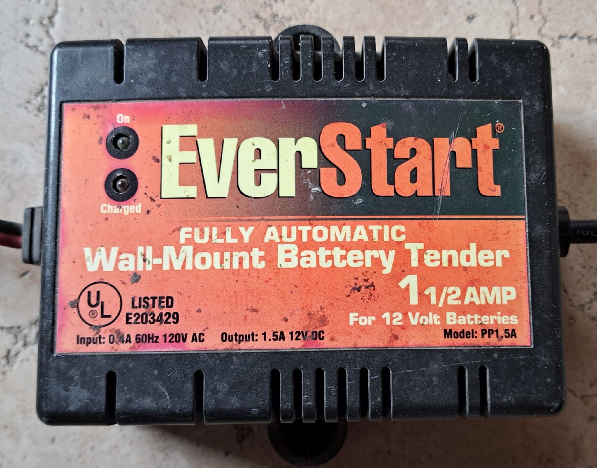 An old battery charger that works well, except the float voltage is a bit low.

Can I reverse engineer this and adjust the float voltage?