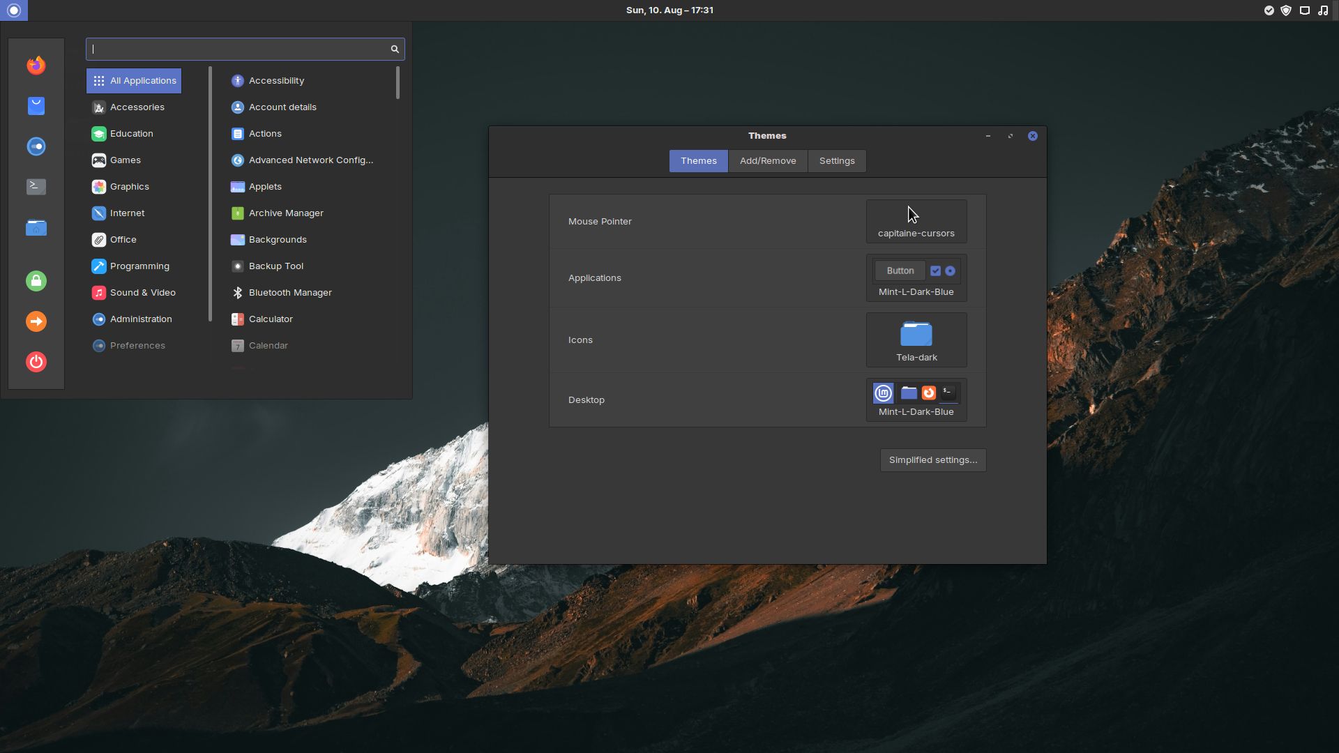 Screenshot eines Linux Mint Desktops mit geöffnetem Startmenü und Themes App.