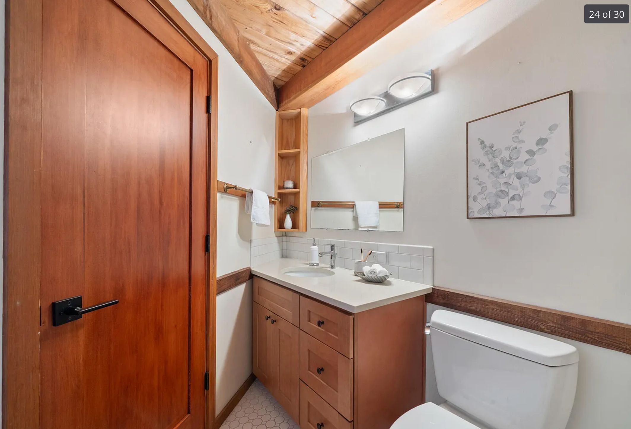 Another angled bathroom and this time the vanity is in the far corner and it definitely wouldn't be possible to open the doors. 