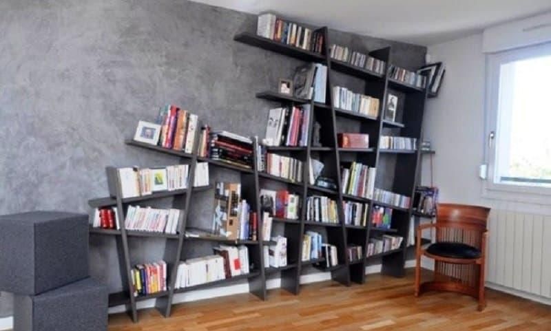 A bookshelf with shelves totally disaligned