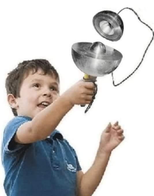 kid with a ball in the cup game except it's the demon core