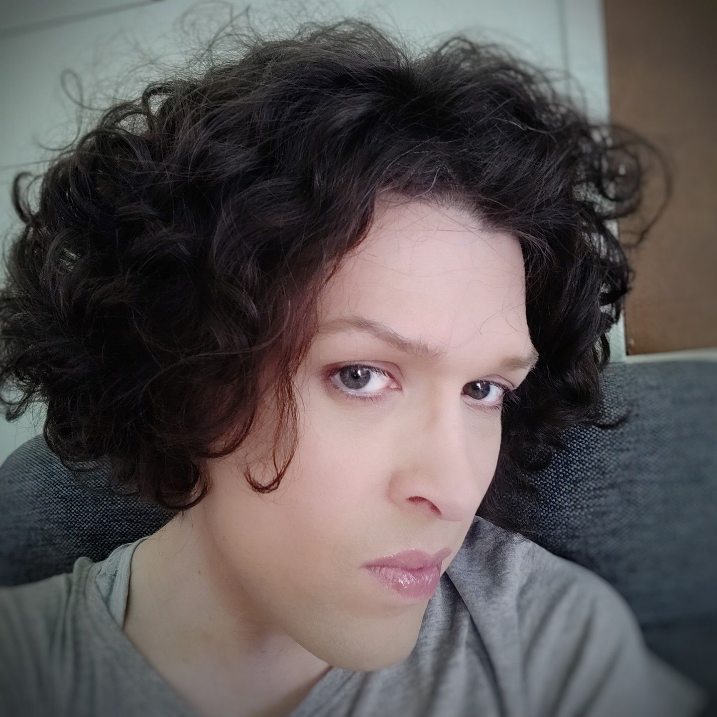 Selfie, head turned away from camera.