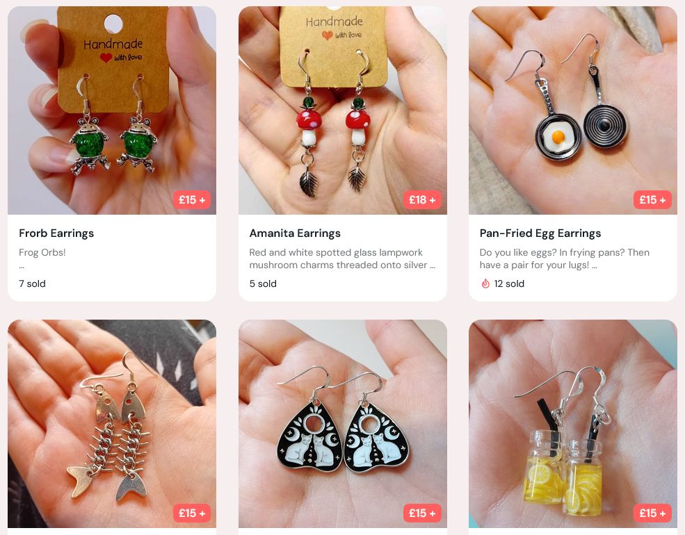 6 picture listings of fishhook earrings with themes ranging from mushrooms, fried eggs in pans, fish skeletons, cat themed mini Ouija planchettes, tiny jars of lemonade, and frogs.