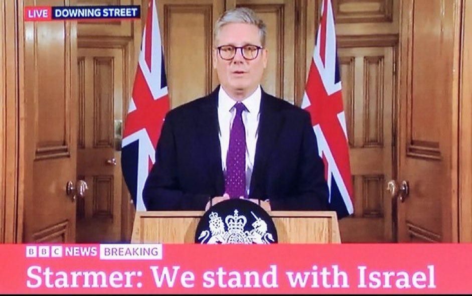 Starmer standing between two union flags beneath the picture is a BBC title reading
Starmer: we stand with Israel