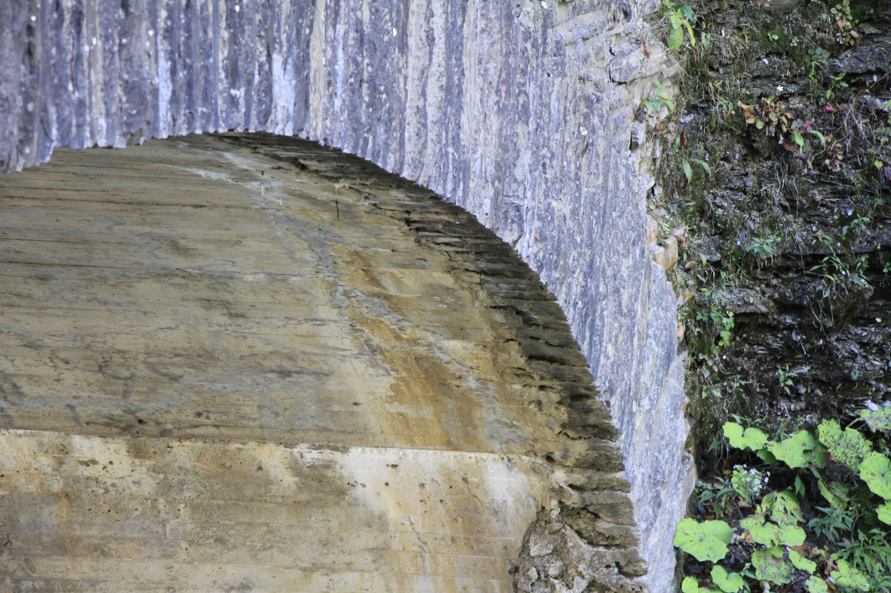Arch under stone bridge