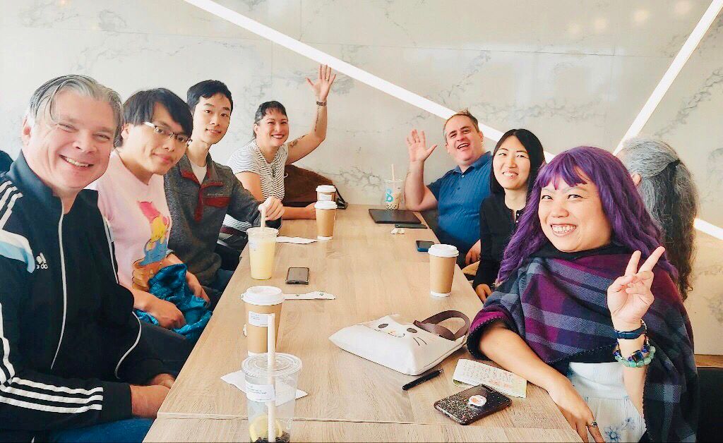 FediCollective group picture for our 1st meetup. Chris and Mayumi (speakers) waving, devs smiling, Founders and designers, also happy here. Crissy putting up a peace sign coz this is what cutie patooties do