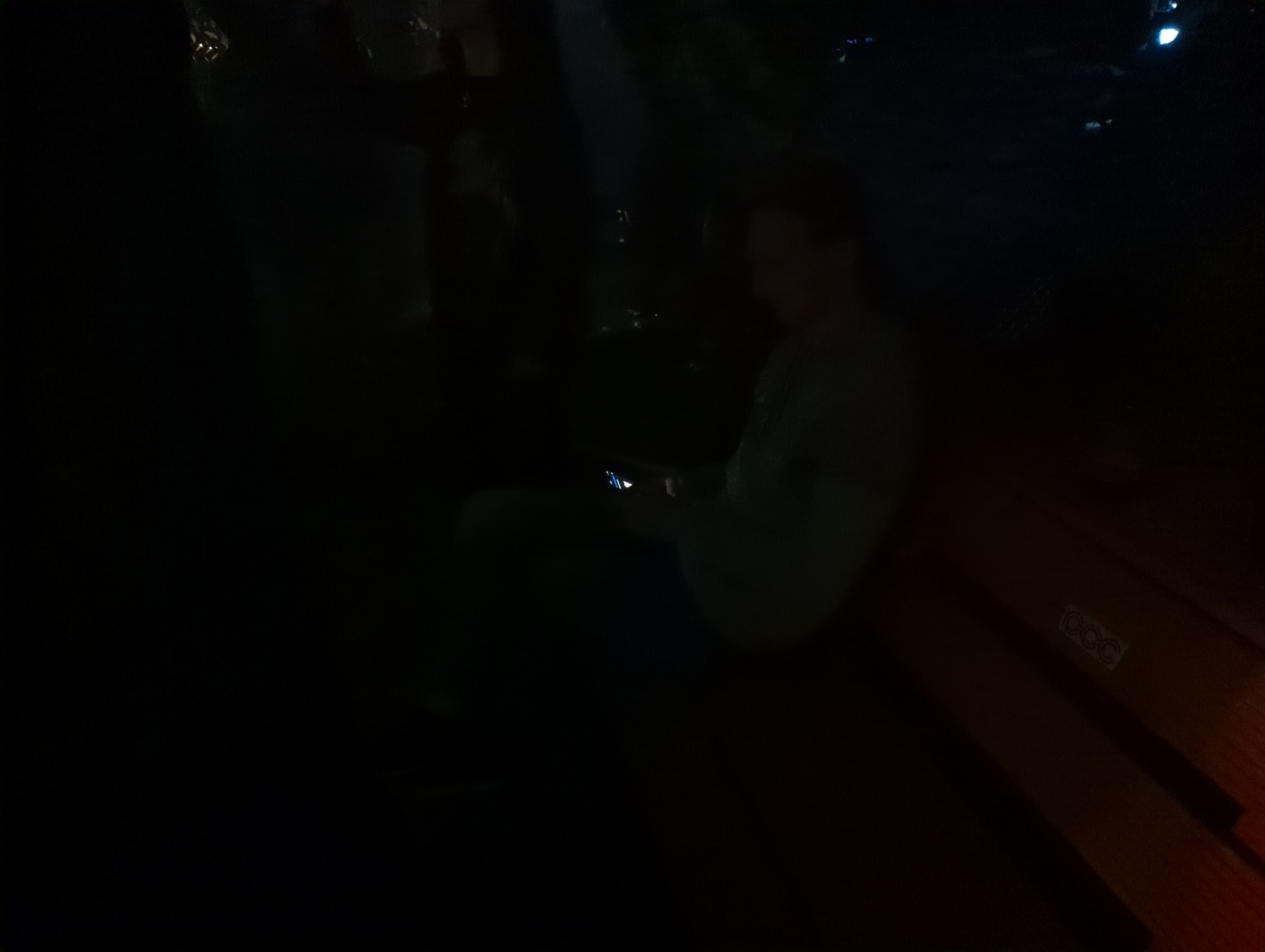 linus sitting at a rave party