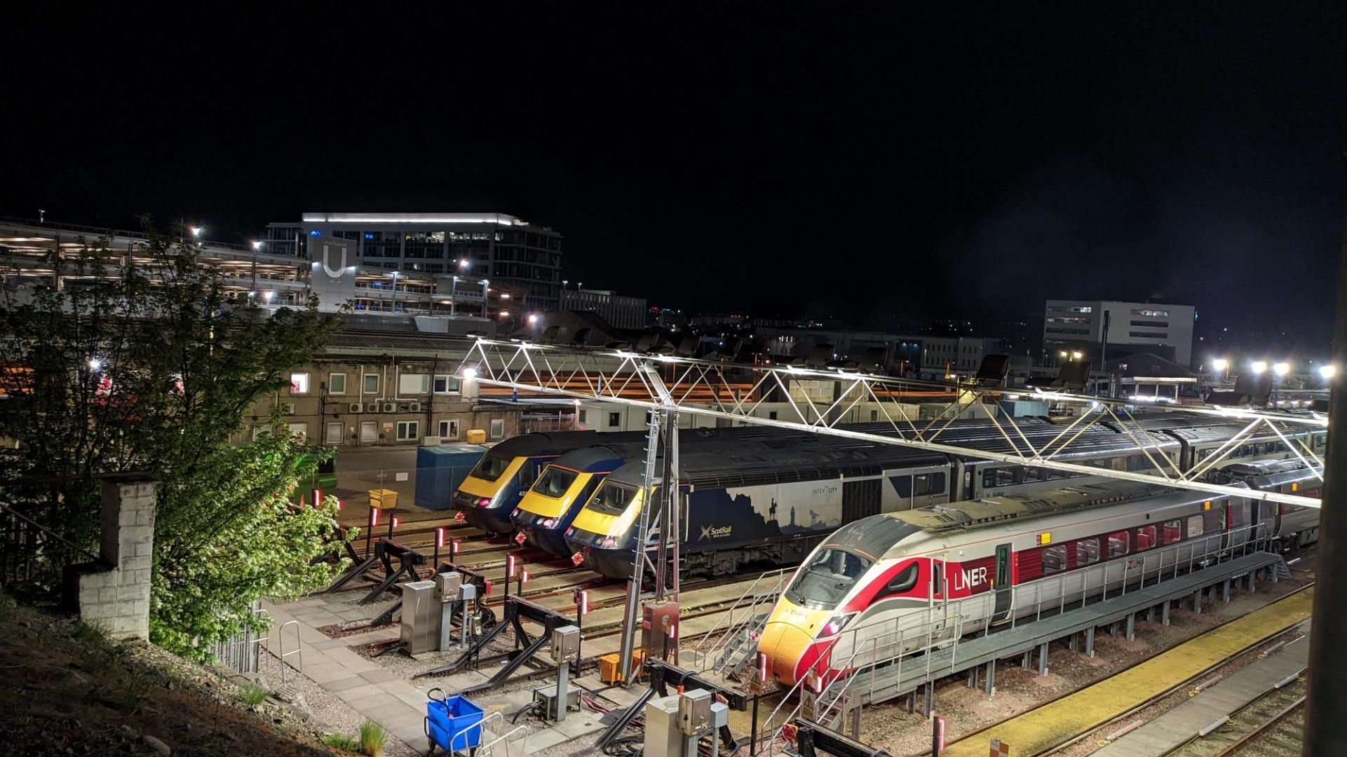 Three Scotrail Inter7City HST and one LNER Azuma in the depot at night