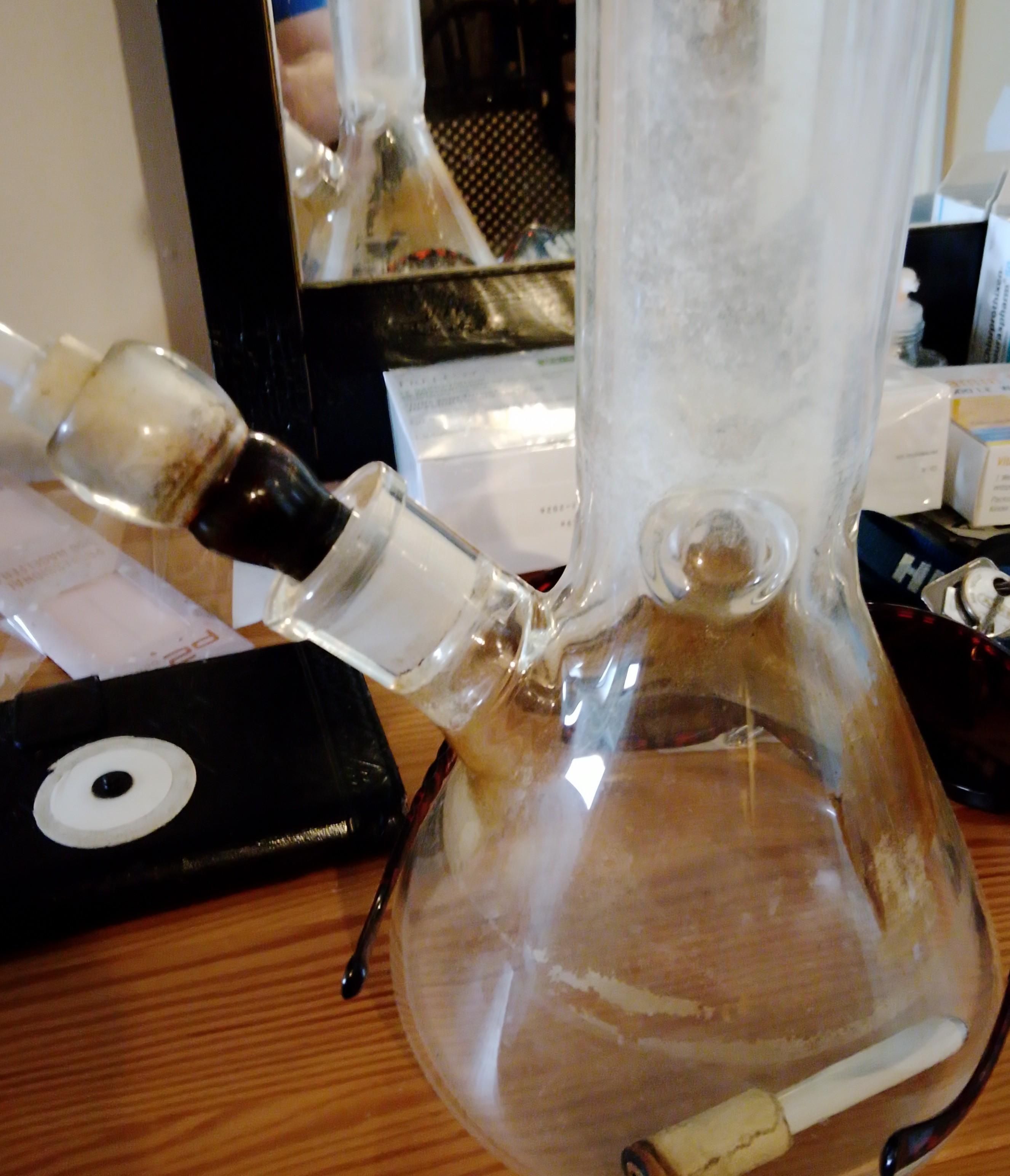 The broken downstem of the Implement of Doom fits perfectly into the fitting on Dexter, another bong, in the shape of an Erlenmeyer flask, which also has a broken downstem. 
