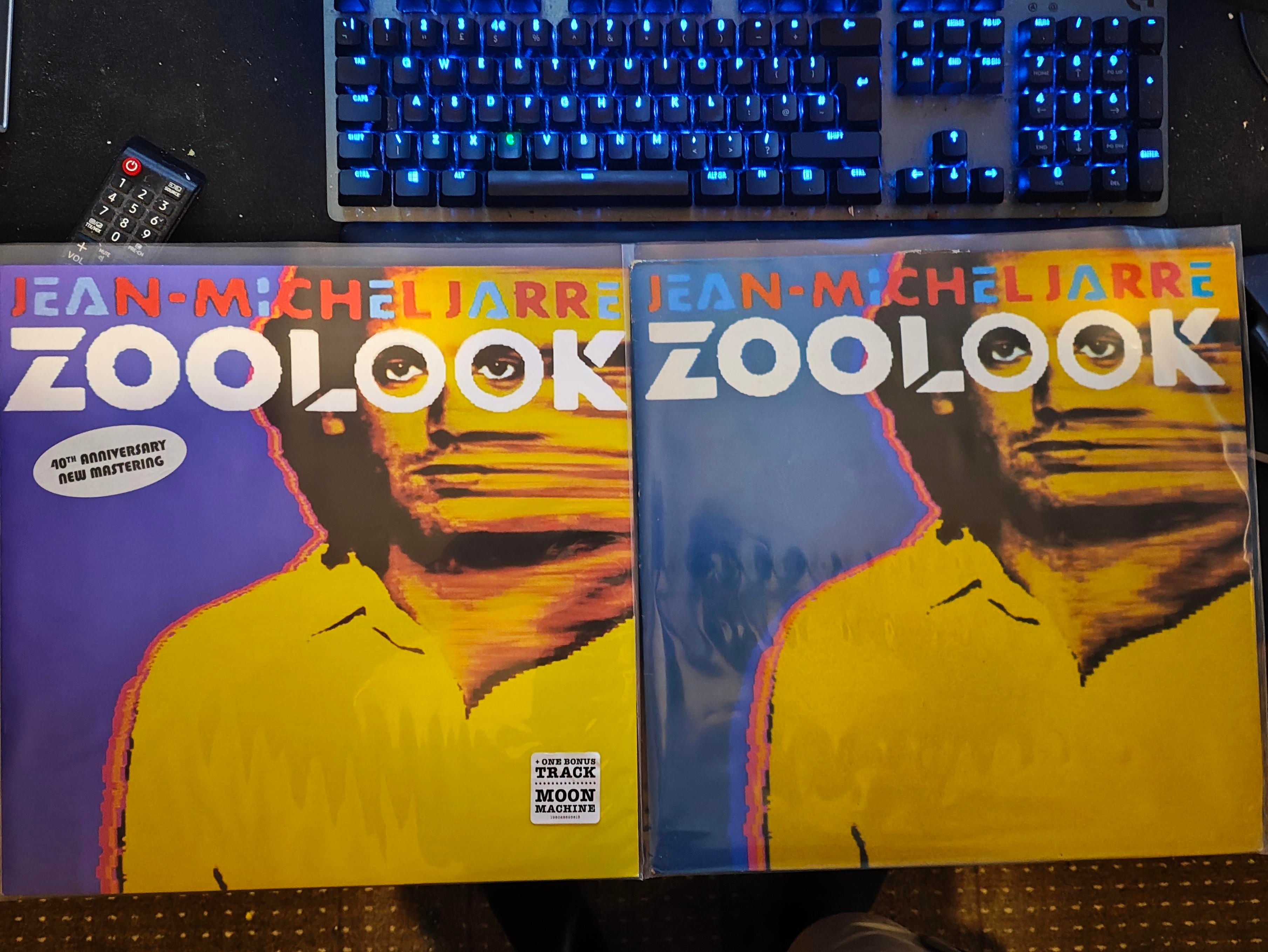 2 of the same album one with a 40th Anniversary new mastering. Cover is man in yellow shirt but image gets smeared off right 