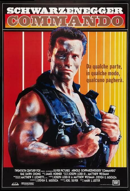 Locandina del film "Commando" con Arnoldo Shwarzenegger armatissimo e bicipitatissimo e tricipitatissimo che dice "Da qualche parte, in qualche modo, qualcuno pagherà".