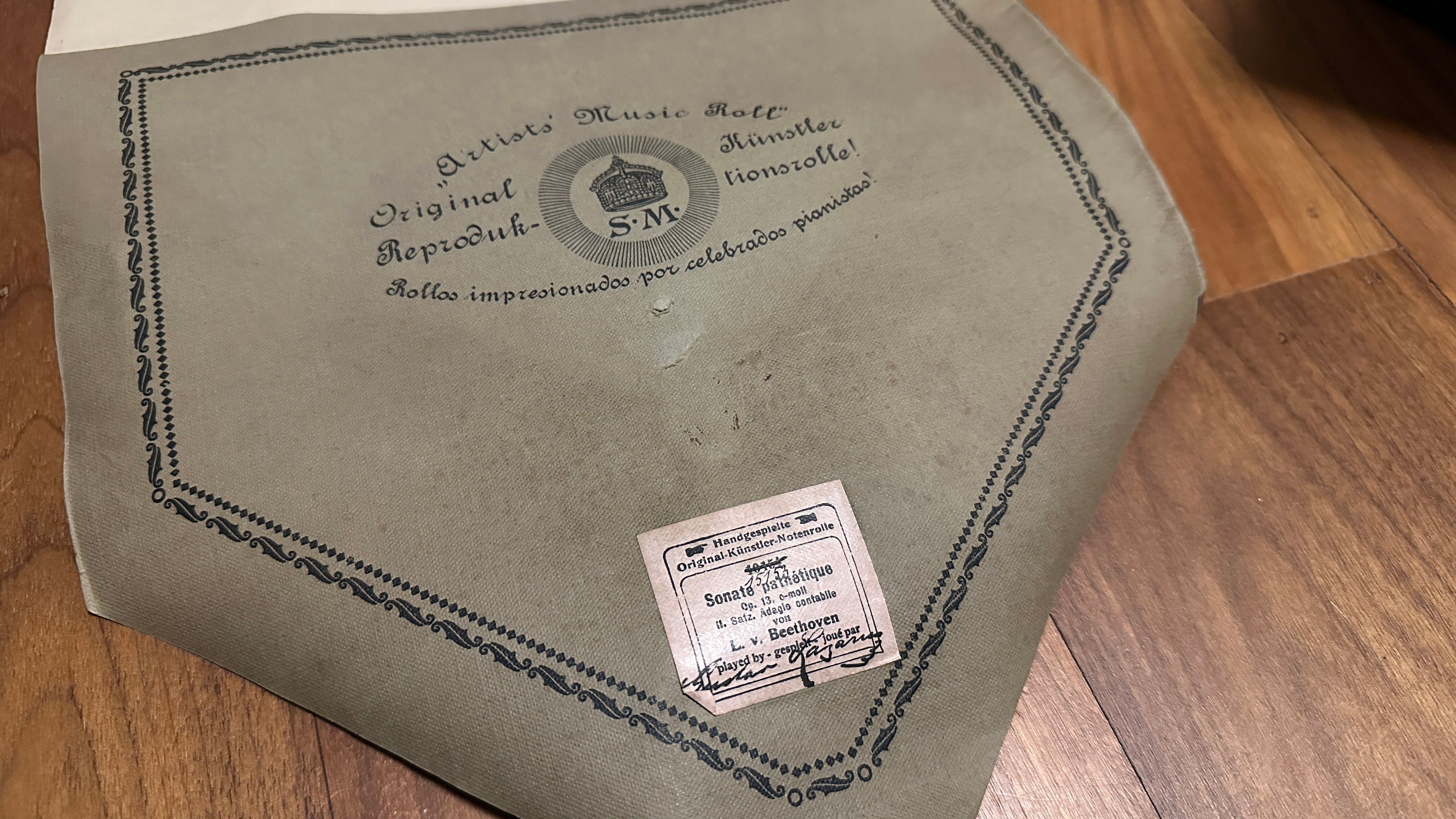 Leader for a piano roll of a Beethoven piece played by a human and recorded to paper. 