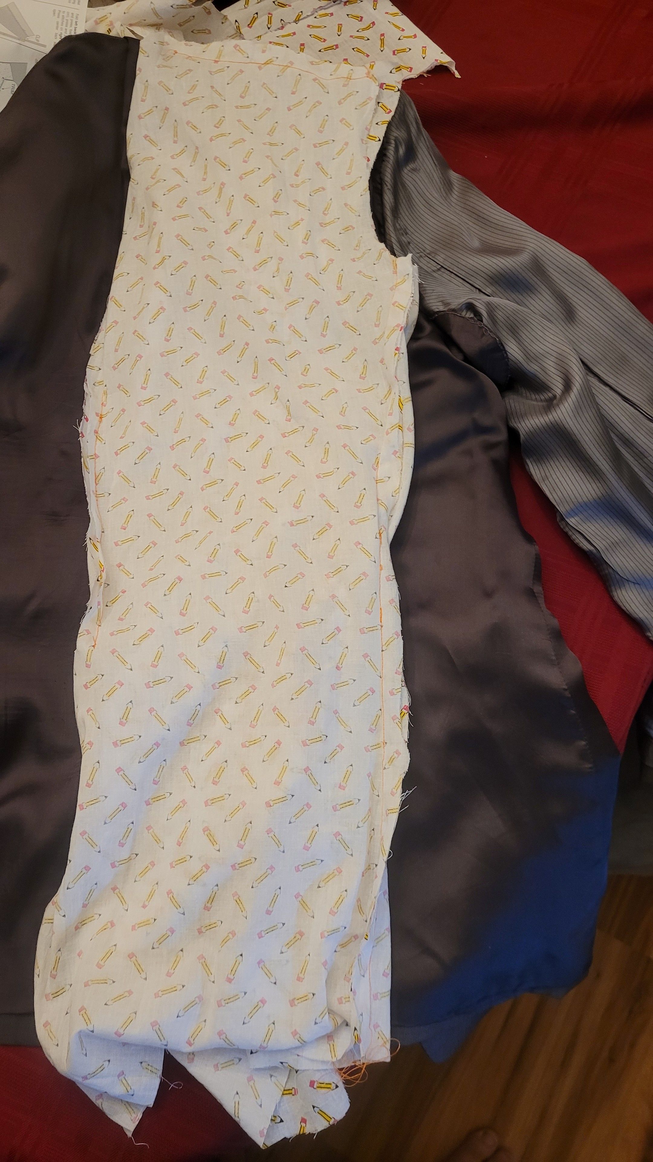 Back pattern laid on jacket that fits. Obviously missing one panel