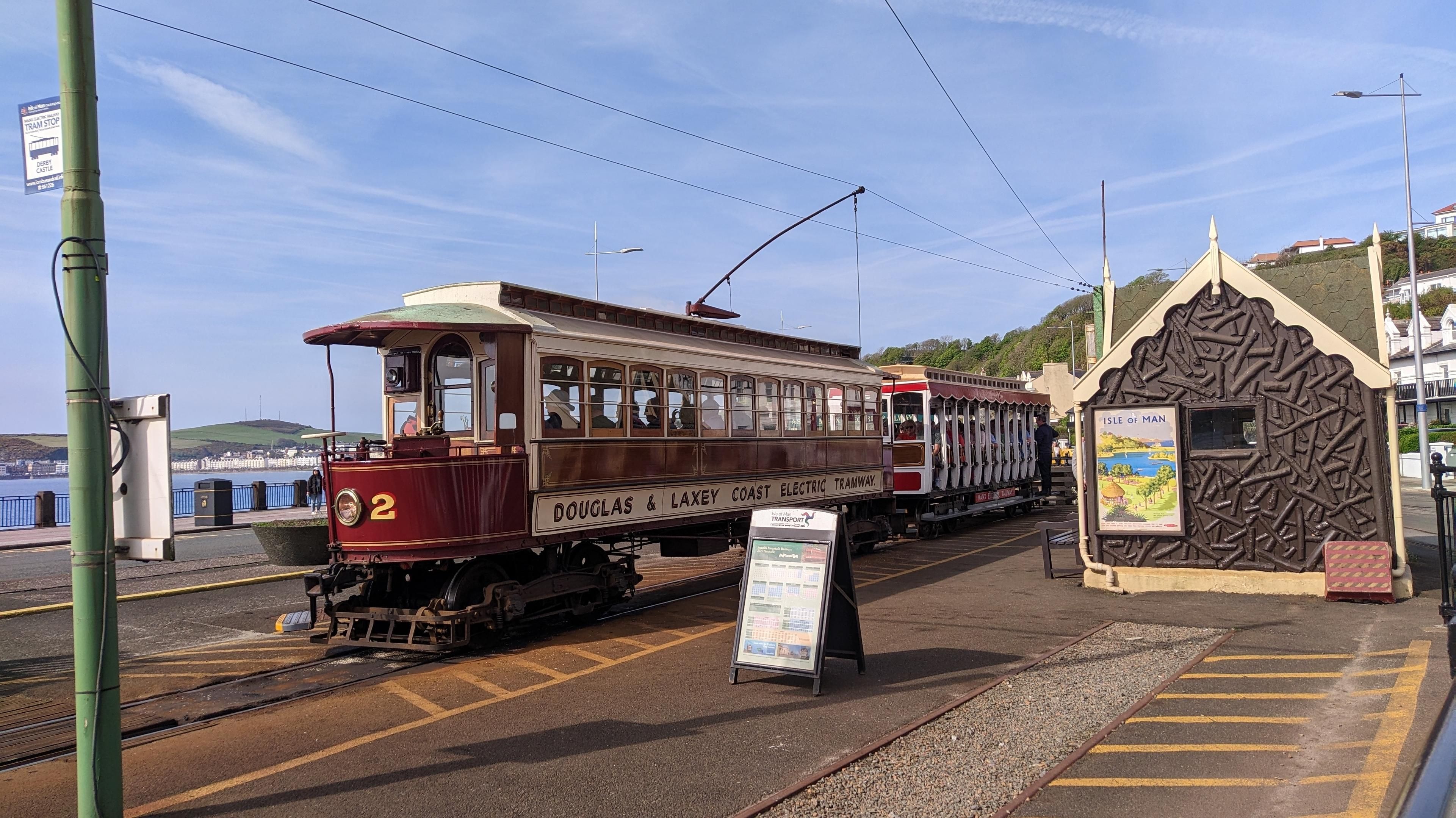 Railcair Nr 2 with additional open seating carriage behind waiting to depart