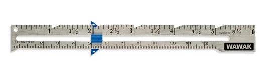 A seam gauge. 6" Keep on track while sewing
Also  good for measuring buttons.