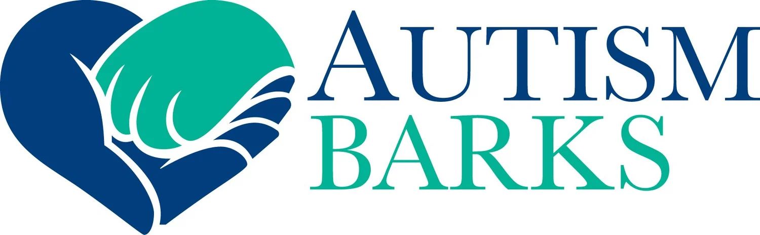 autism barks logo, a heart made out of a paw held in a hand