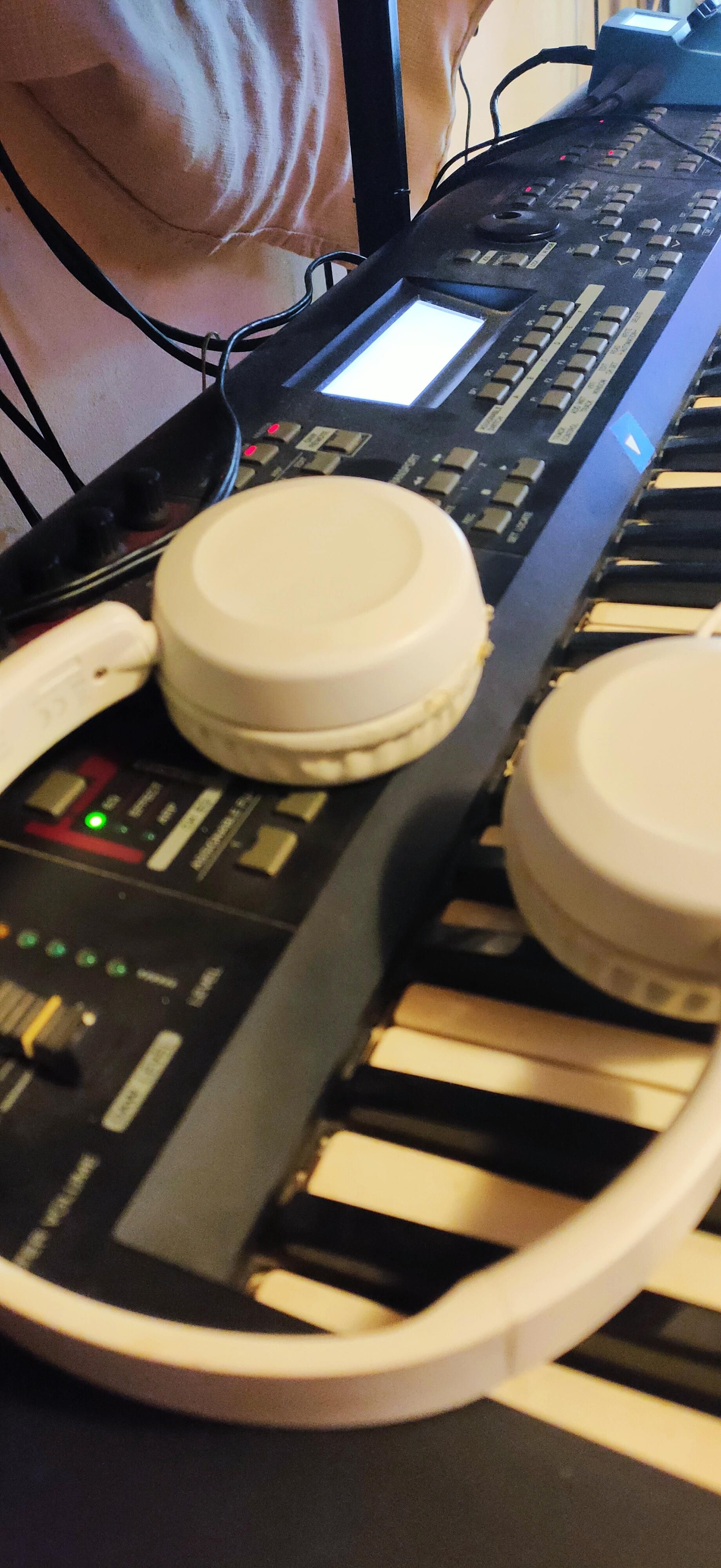 This is a shot of my music keyboard Yamaha MOX6 where there are lots of knobs and leds