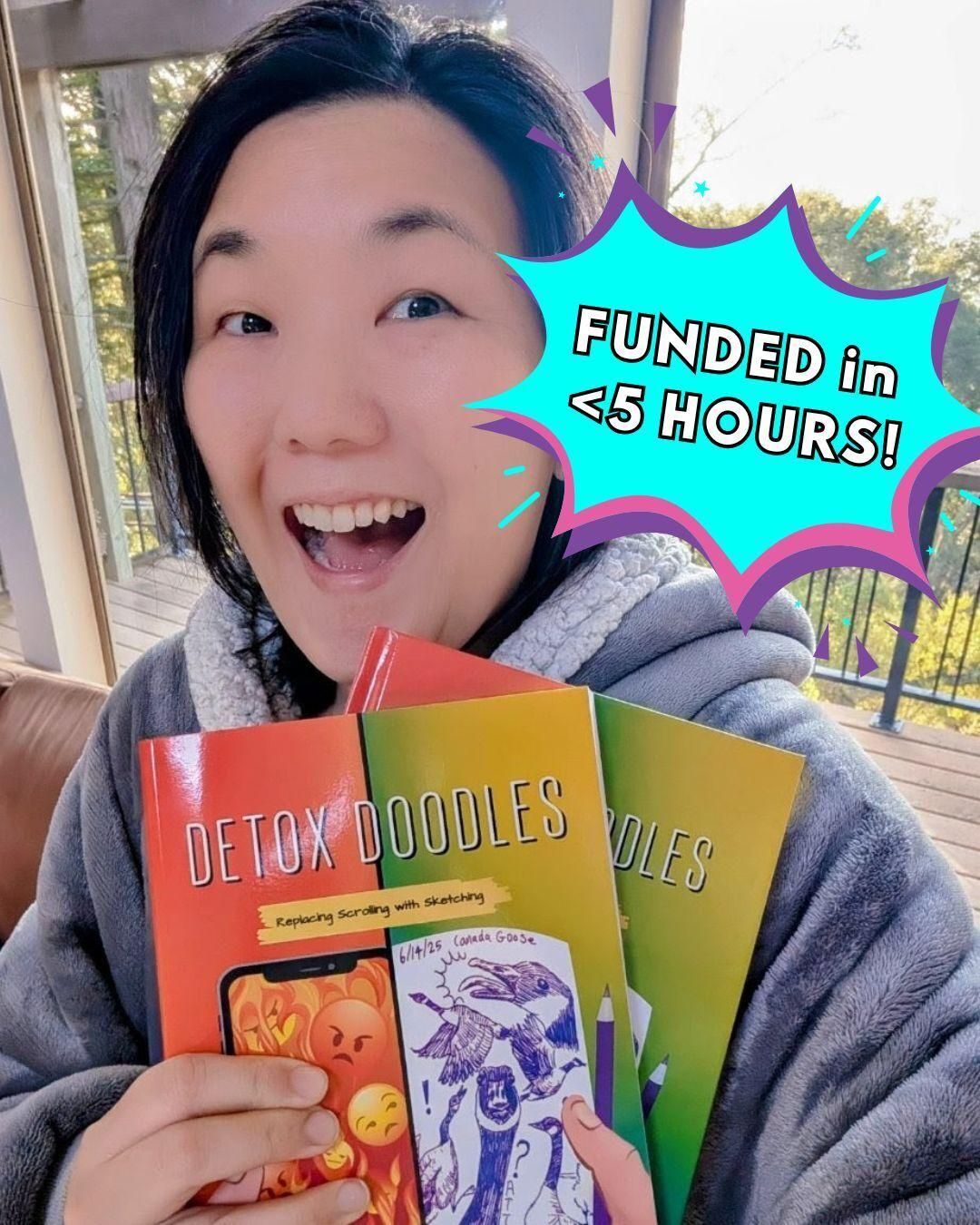Joy Chew holding two copies of Detox Doodles and smiling. A blue, pink and purple explosion image with the text "Funded in <5 Hours!" written inside is to her right.